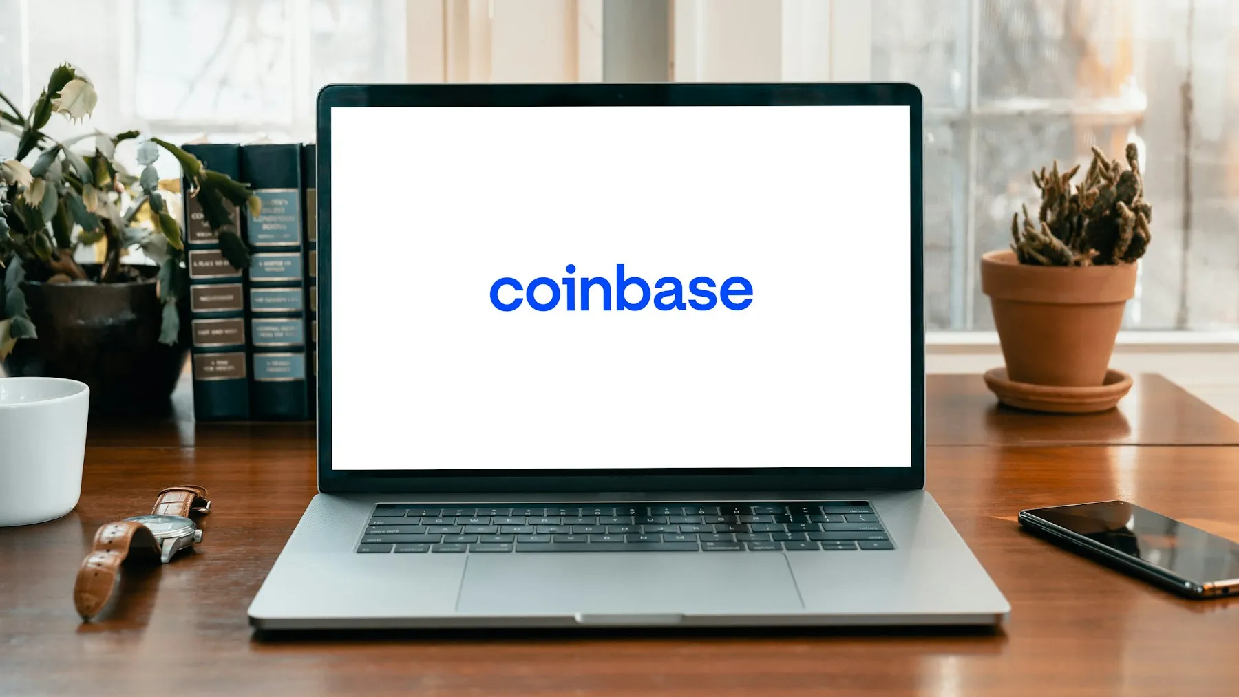 Coinbase Cuts 14% of Staff as CEO Declares AI-Native Restructuring: 700 Gone, Stock Rises — Tech Arcade